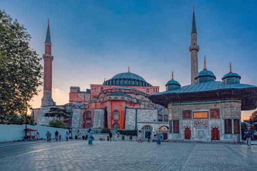 Istanbul, Turkey - August 5, 2022: People behind Hagia Sophia Camii mosque or Ayasofya (Turkish), Istanbul, Turkey.