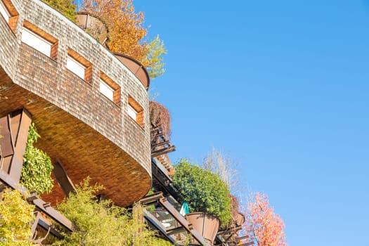 Turin, Italy - Circa November 2021: real estate green residential building. Exterior with modern design, plants and wood integrated. This Treehouse Suite is named 25 Verde