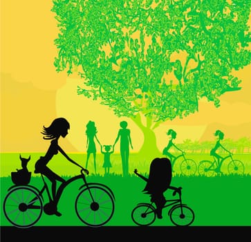 Mother and daughter biking in the park