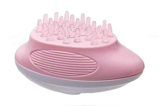 Close up of a battery operated scalp massage brush, shampoo brush or scalp massager for exfoliating and massaging the scalp.Clipping path. Beauty and health concept.