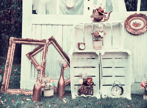 Vintage still life decoration for wedding reception. Marriage and love concept in retro style. Bridal arrangement.