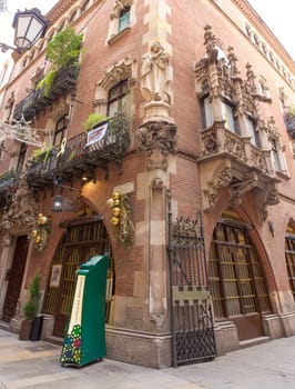 Barcelona, Spain - Dec 29th, 2019: Els Quatre Gats cafe, popular meeting place for famous artists. Entrace