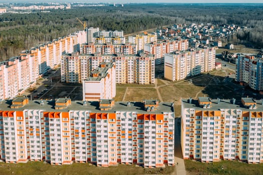 Gomel, Belarus. Aerial Bird's-eye View Of New Residential Multi-storey Houses. Cityscape Skyline In Sunny Spring Day. Real Estate, Development Industry. High-rise Buildings.