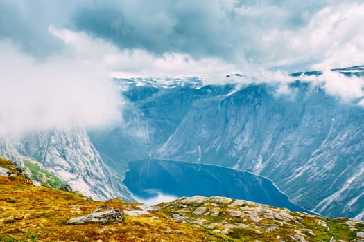 Clouds, Blue Sky Over Norwegian Mountains And Lake Landscape. Nature Of Norway. Travel And Hiking. Amazing Scenic View. Scandinavia.