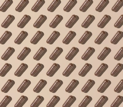 Capsules on light beige top view, hard shadows, creative pattern. Preventive medicine and healthcare, taking dietary supplements and vitamins. Assorted pharmaceutical medicine capsules