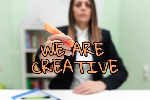 Inspiration showing sign We Are Creative, Conceptual photo To have a lot of creativity original ideas good for design Man studying book learning new business strategies to achieve goals.