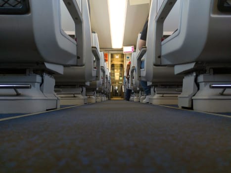 Normal class train carriage corridor. Ground view