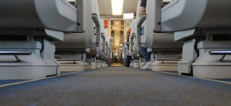 Normal class train carriage corridor. Ground view