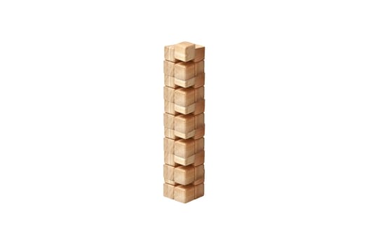 Tower from wooden blocks isolated on white background. Copy space.