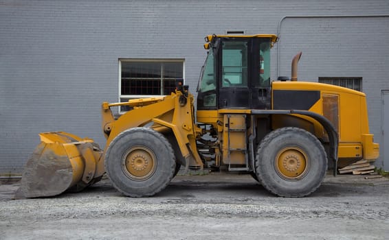 tractor loader yellow excavator construction site heavy equipment hydraulic shovel