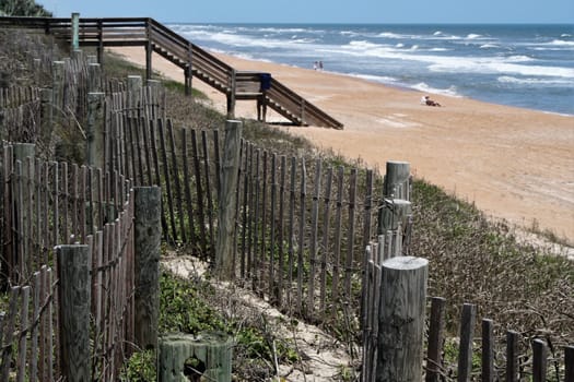 Atlantic ocean views of sand and waves and wood stairs