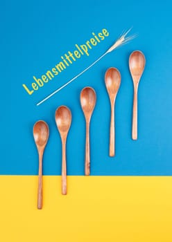 Food crisis with increasing prices and shortages, supply chain problems, inflation causes high living costs, ukrainian colored background,german language