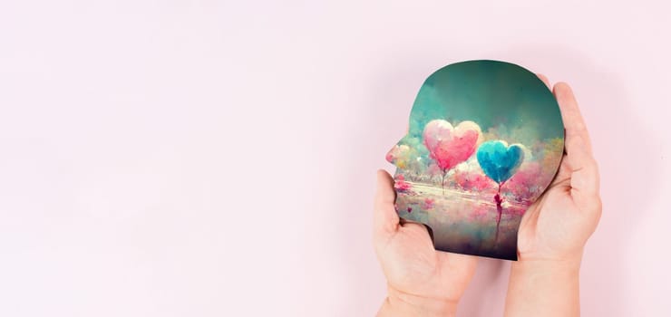 Holding a head with a colorful hearts in the hands, symbol of love and positive emotion, charity and support