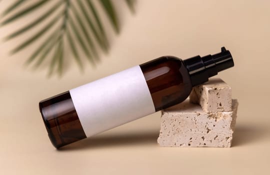 Glass cosmetic one pump bottle on stone on light beige with a palm leaf, close up, label mockup. Skincare beauty product, lotion or essence. Natural cosmetics.