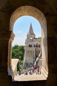 Tourists from all over the world on the Fisherman's Bastion, Halászbástya, completed in 1902, on the bank of the Danube at Castle Hill in the Buda district of Budapest, Hungary