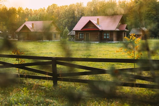 Berezinsky, Biosphere Reserve, Belarus. Traditional Belarusian Tourist Guest Houses In Early Autumn Landscape. Popular Place For Rest And Active Eco-tourism In Belarus.