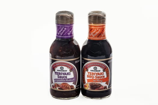 WETZLAR, GERMANY - 2022-07-17: Two Bottles of Kikkoman Teriyaki Sauce. In 1917 the Japanese Mogi and Takanashi families founded Noda Shoyu Co. Ltd. The company name was changed to Kikkoman Shoyu Co. Ltd. in 1964 and to Kikkoman Corporation in 1980.