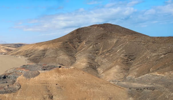View over a landscape formed by volcanoes on Fuerteventura.