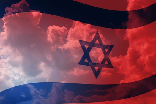 The national flag of Israel against a blue and red sky.