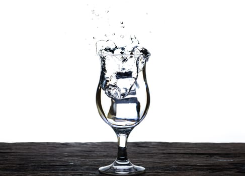 The image of pouring drinking water, into a glass, that makes one feel refreshed isolated on white background, Splashing water, Sparkling water