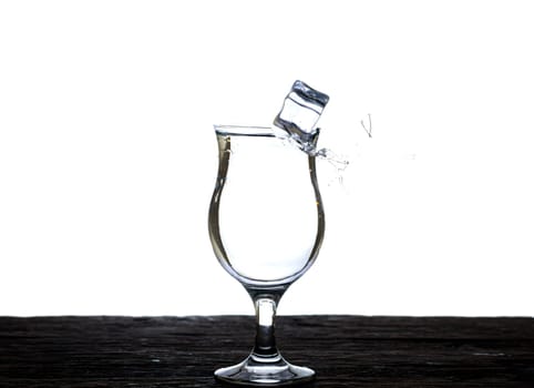 The image of pouring drinking water, into a glass, that makes one feel refreshed isolated on white background, Splashing water, Sparkling water