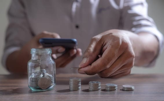 Save money and account banking for finance concept, Piggy bank with coin on blurred background, Save Monney for Investors Using Internet to Trade Stocks or Trade Fund