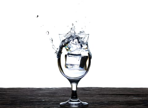 The image of pouring drinking water, into a glass, that makes one feel refreshed isolated on white background, Splashing water, Sparkling water