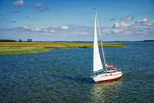 Sailing boat on the Zingster Strom waters, Fischland-Darß Peninsula, Mecklenburg-West Pomerania, Germany