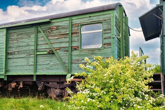 old wagons and tracks on the former railway line to Fischland-Darss peninsula, Bresewitz, Mecklenburg-Western Pomerania, Germany