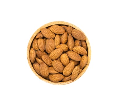 Almonds in brown wooden bowl isolated on white background, top view. Healthy organic super food concept