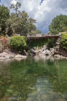 La Maquina Natural swimming pool. Crystal-clear waters spot in the heart of La Vera County, Caceres, Extremadura, Spain