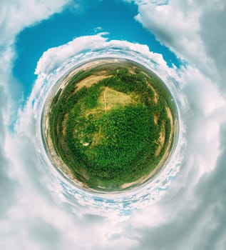 Aerial View Green Coniferous Forest Pines Woods Landscape In Sunny Spring Day. Top View Of Beautiful European Nature From High Attitude. Drone View. Bird's Eye View. Little Small Planet Concept.
