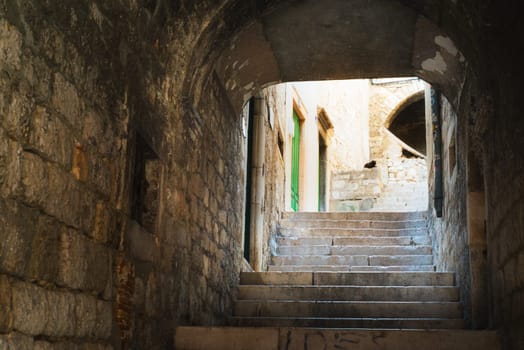 Steep stairs and streets of sibenik with a cat