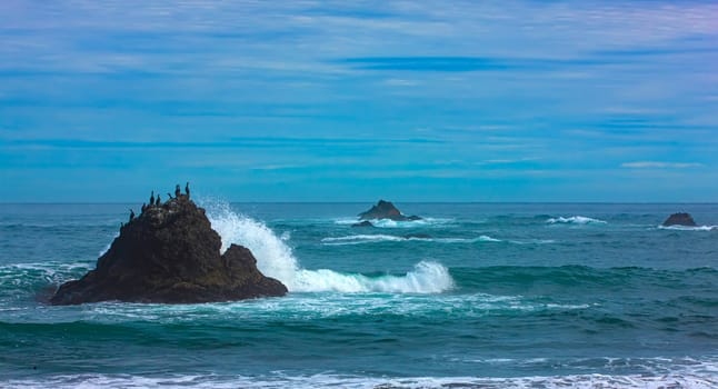 The  kamchatka peninsula, pacific ocean, waves and rocks
