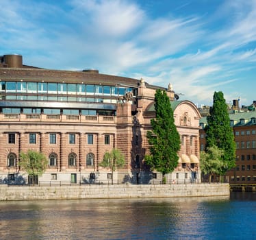 Swedish Parliament House, Riksdagshuset, located on the island of Helgeandsholmen, Old town, or Gamla Stan, Stockholm, Sweden, in a summer day
