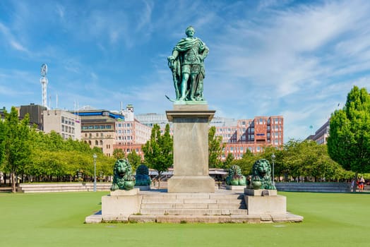 Statue of King Carl XIII mediating King's Garden, Kungstradgarden, or Kungsan, a park in Norrmalm district, central Stockholm, in a sunny summer day, Stockholm, Sweden
