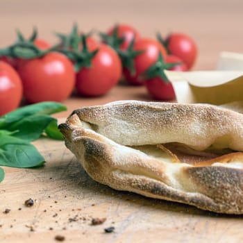Pinsa romana and scrocchiarella gourmet italian cuisine. Traditional dish in italy.
