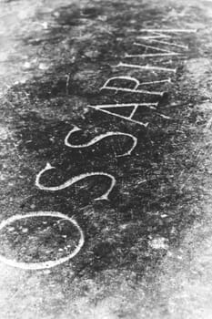 Stone with the engraving in Latin "Ossarium"" (translation from latin Ossuary)."
