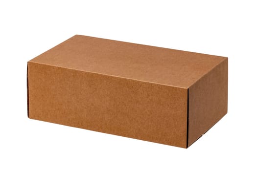Closed brown cardboard box or kraft paper box with clipping path isolated on white background. Suitable for packaging. Macro.
