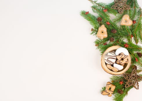 Christmas tree made from fir branches, red stars and a cinnamon stick as the trunk, greeting card with copy space