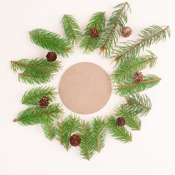 Christmas holiday background, frame with fir branches and cones, winter season greeting card with copy space