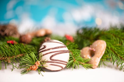 Nurnberg elisen gingerbread mix, traditional german christmas sweets with fir branches and pine cones, holiday background with copy space