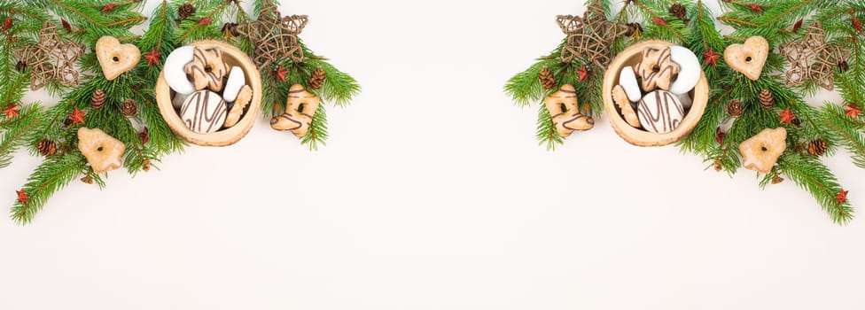 Christmas tree made from fir branches, red stars and a cinnamon stick as the trunk, greeting card with copy space