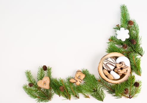 Christmas tree made from fir branches, red stars and a cinnamon stick as the trunk, greeting card with copy space