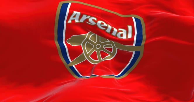London, UK, May 2022: The flag of Arsenal Football Club waving. Arsenal is a professional football club based in Islington, London, England.