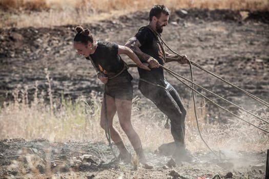 Merida, Spain - Sept 11th, 2022: FarinatoRace Merida 2022. Dragging steel beam piece