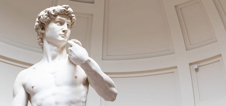 Florence, Italy - Circa August 2021: David sculpture by Michelangelo Buonarroti. The masterpiece of the Renaissance art.