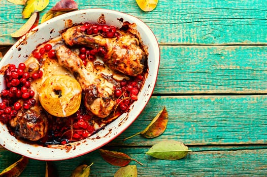 Chicken legs with berry sauce.Chicken roasted drumsticks.Copy space