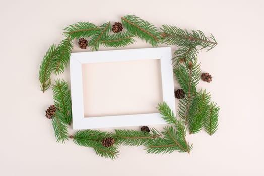 Christmas holiday background, frame with fir branches and cones, winter season greeting card with copy space