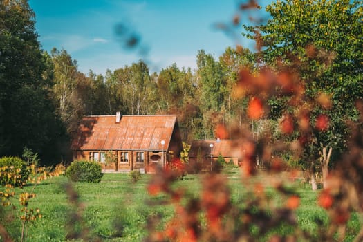 Berezinsky, Biosphere Reserve, Belarus. Traditional Belarusian Tourist Guest Houses In Early Autumn Landscape. Popular Place For Rest And Active Eco-tourism In Belarus.
